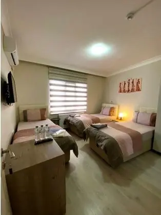 Üç Kişilik Oda