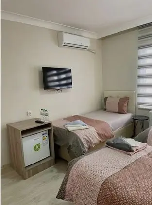 Üç Kişilik Oda
