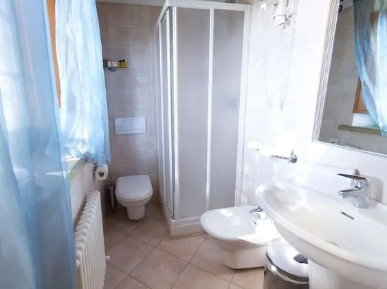 Camera matrimoniale con letto aggiunto