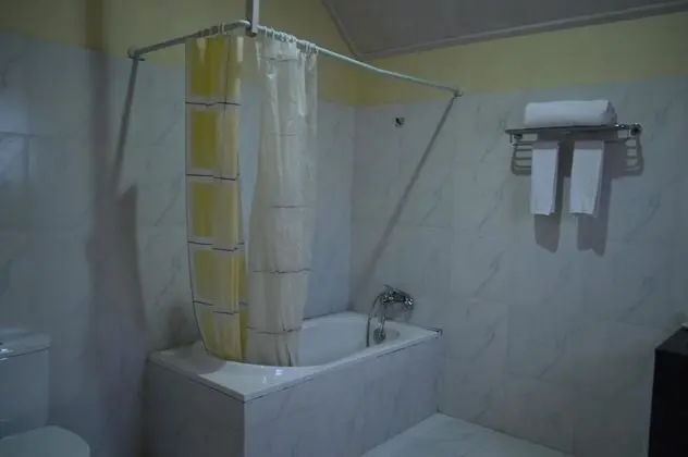 Deluxe Tek Büyük veya İki Ayrı Yataklı Oda