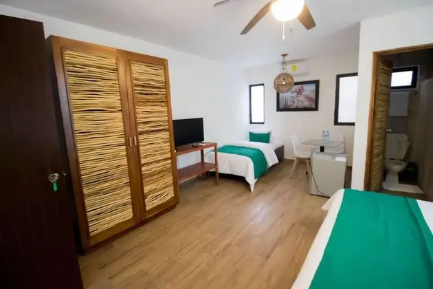 Deluxe Üç Kişilik Oda, Bahçe Manzaralı