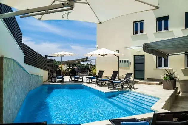 Deluxe apartment with two bedrooms, terrace, and garden view