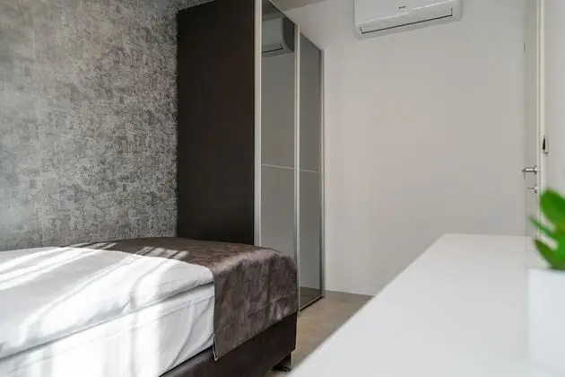 Deluxe apartment with two bedrooms, terrace, and garden view