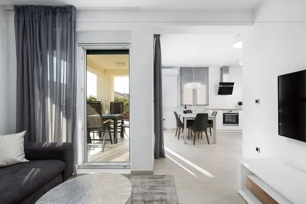 Deluxe apartment with two bedrooms, terrace, and garden view