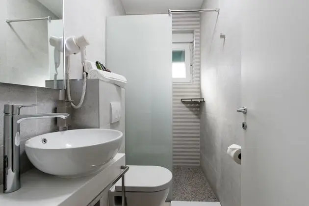 Deluxe apartment with two bedrooms, terrace, and garden view