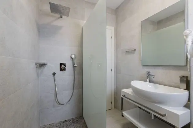 Deluxe apartment with two bedrooms, terrace, and garden view