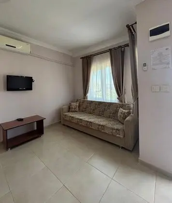 Aile Odası,Havuz ve Bahçe Manzaralı,Bahçe Katı