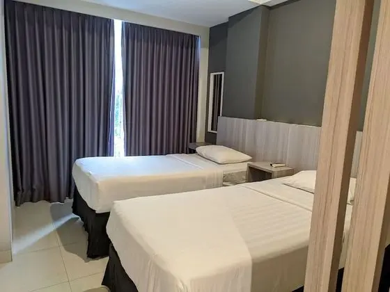 Deluxe Tek Büyük veya İki Ayrı Yataklı Oda