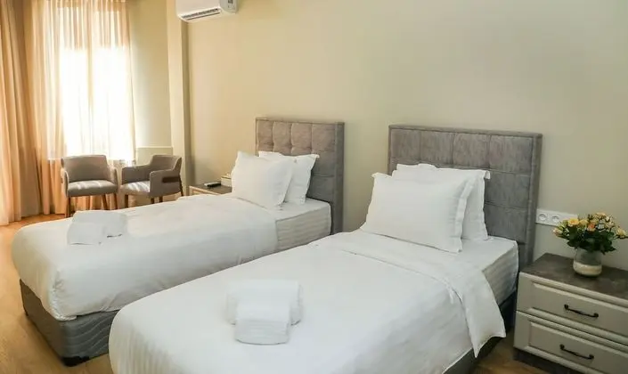 Superior Tek Büyük veya İki Ayrı Yataklı Oda