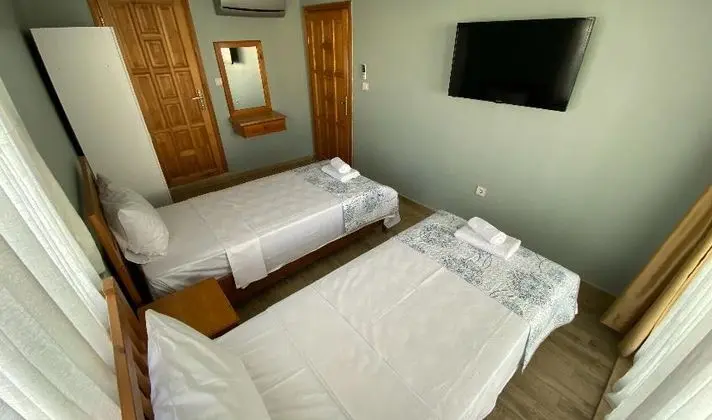 2 Tek Yataklı Oda 