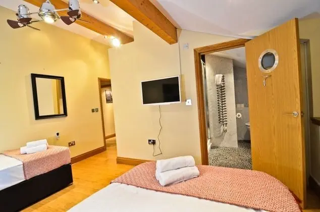Deluxe Tek Büyük veya İki Ayrı Yataklı Oda