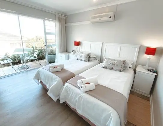 Twin bed room, sea and mountain views