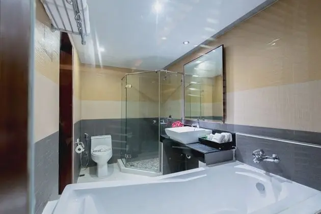 Deluxe Tek Büyük veya İki Ayrı Yataklı Oda