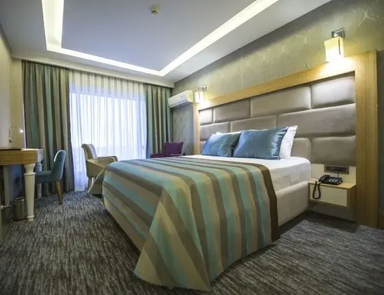 Deluxe Tek Büyük veya İki Ayrı Yataklı Oda