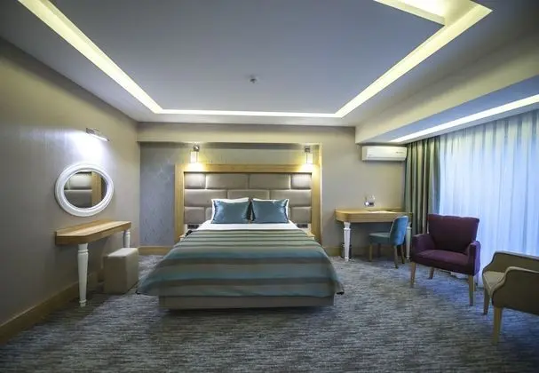 Deluxe Tek Büyük veya İki Ayrı Yataklı Oda