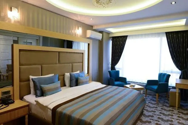 Deluxe Tek Büyük veya İki Ayrı Yataklı Oda