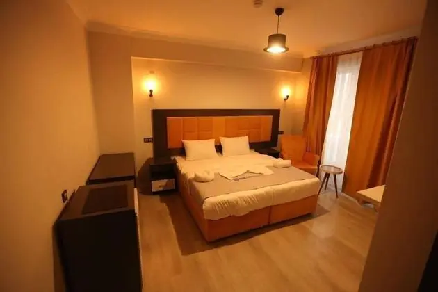 Deluxe Tek Büyük veya İki Ayrı Yataklı Oda