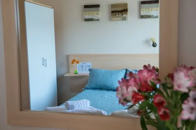 Deluxe Tek Büyük veya İki Ayrı Yataklı Oda