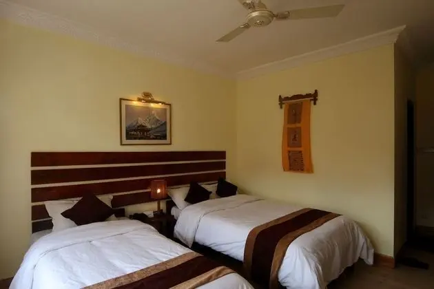 Deluxe Tek Büyük veya İki Ayrı Yataklı Oda