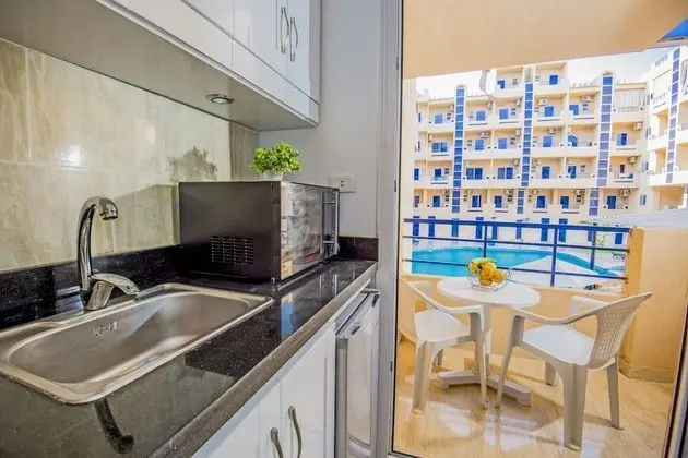 Pool View, Balcony, Kitchenette, Washing Machine | Tiba Resort E4