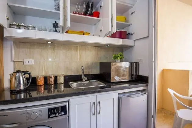 Pool View, Balcony, Kitchenette, Washing Machine | Tiba Resort E4
