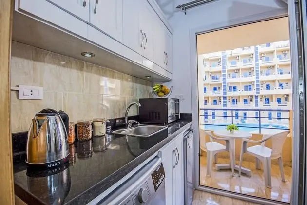 Pool View, Balcony, Kitchenette, Washing Machine | Tiba Resort E4