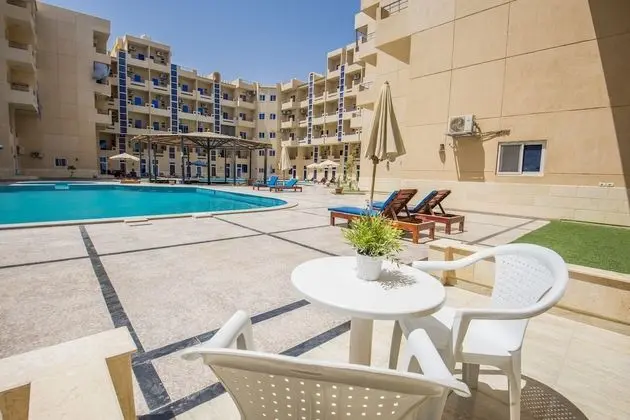 Poolside, Patio, Washing Machine, Kitchenette | Tiba Resort P4