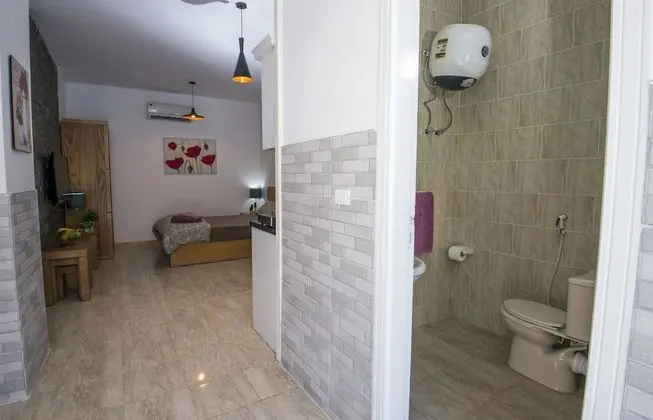 Poolside, Patio, Washing Machine, Kitchenette | Tiba Resort P4