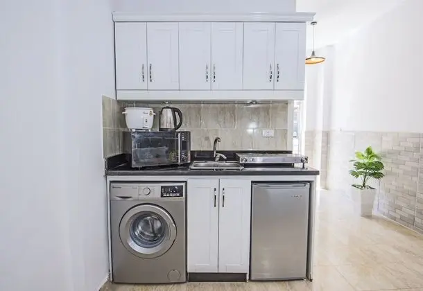 Poolside, Patio, Washing Machine, Kitchenette | Tiba Resort P4