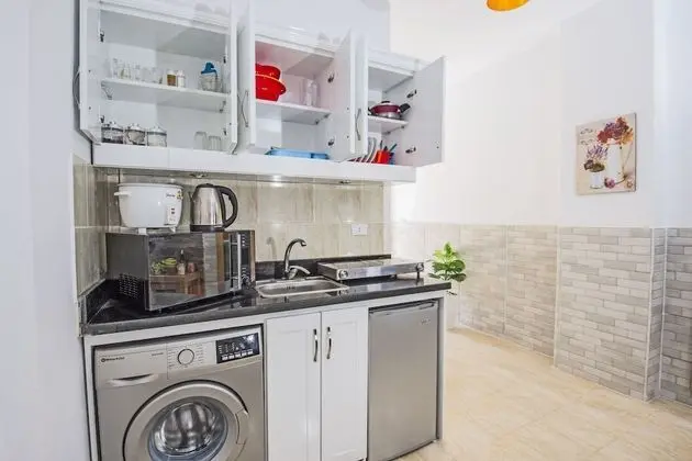 Poolside, Patio, Washing Machine, Kitchenette | Tiba Resort P4