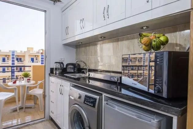 Top Floor Pool View, Balcony, Kitchenette, Washing Machine | Tiba Resort C34