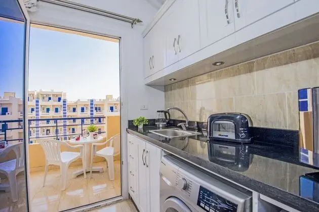 Top Floor Pool View, Balcony, Kitchenette, Washing Machine | Tiba Resort C34