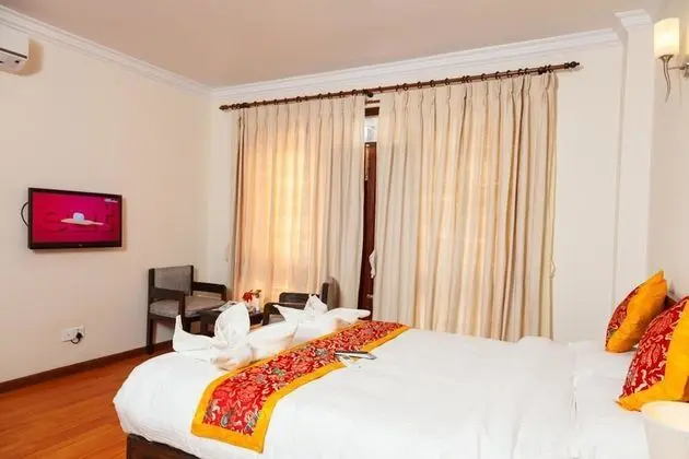 Deluxe Tek Büyük veya İki Ayrı Yataklı Oda