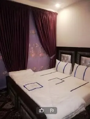 Deluxe Tek Büyük veya İki Ayrı Yataklı Oda