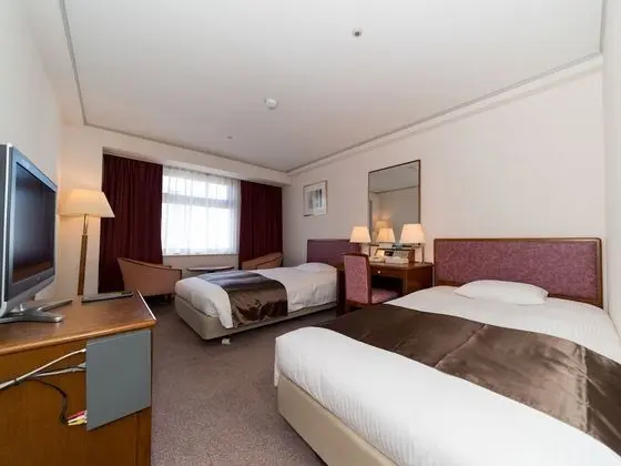 Üç Kişilik Oda, Sigara İçilebilir (2 Single beds + 1 Extra bed)