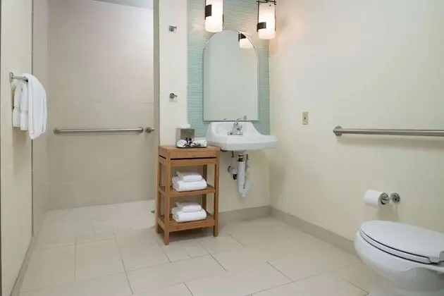 Two Queens with Balcony ADA Shower/Tub Combo