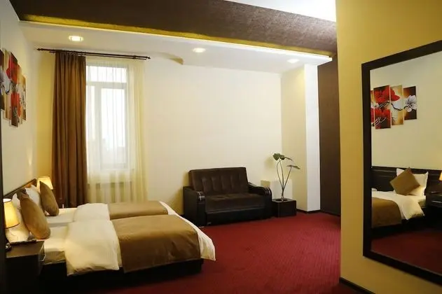 Deluxe Tek Büyük veya İki Ayrı Yataklı Oda
