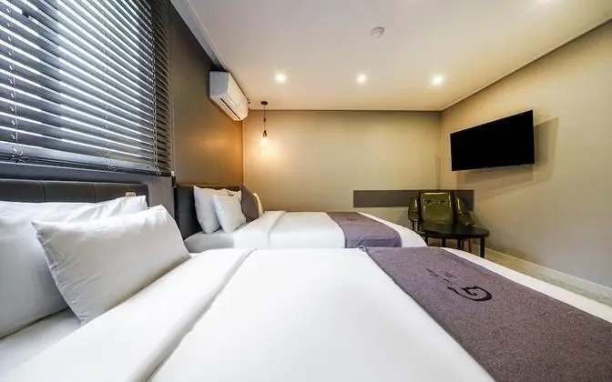Oda (Deluxe Twin (Double + Single Bed Netf)