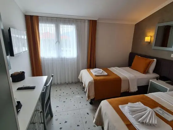 https://images.etstur.com/imgproxy/resize/2560x1440/files/images/hotelImages/etsrooms/915/Tonoz_Beach_Oludeniz_20260109094453_1.jpg