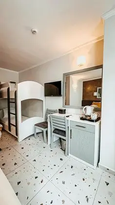 https://images.etstur.com/imgproxy/resize/2560x1440/files/images/hotelImages/etsrooms/915/Tonoz_Beach_Oludeniz_20260109095432_0.jpg