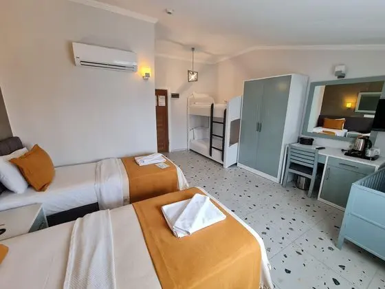 https://images.etstur.com/imgproxy/resize/2560x1440/files/images/hotelImages/etsrooms/915/Tonoz_Beach_Oludeniz_20260109095502_1.jpg