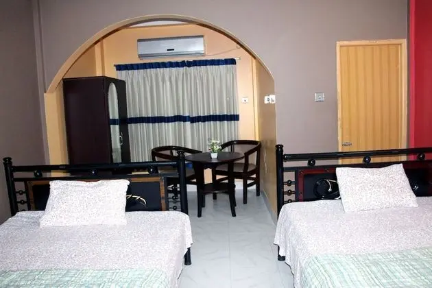 Deluxe Dört Kişilik Oda, Birden Çok Yatak, Sigara İçilebilir, Bahçe Manzaralı