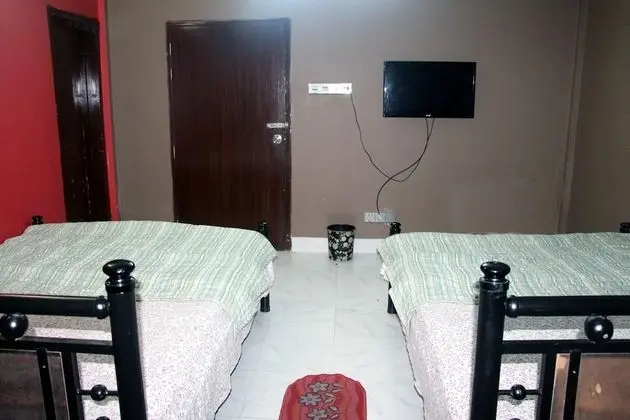 Deluxe Dört Kişilik Oda, Birden Çok Yatak, Sigara İçilebilir, Bahçe Manzaralı