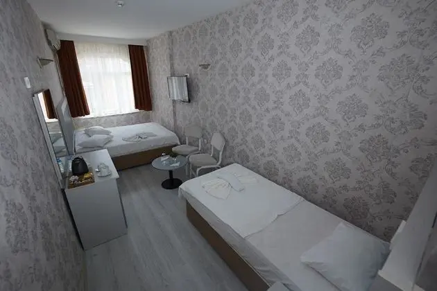 Üç Kişilik Oda