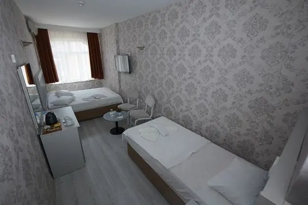 Üç Kişilik Oda