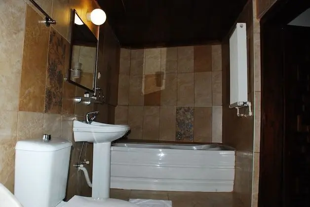 Deluxe Tek Büyük veya İki Ayrı Yataklı Oda
