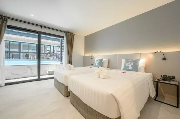 Deluxe Tek Büyük veya İki Ayrı Yataklı Oda, Havuz Kullanımı