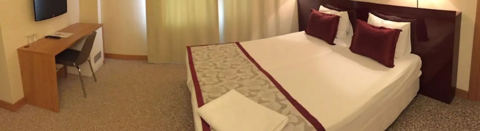 Deluxe Tek Büyük veya İki Ayrı Yataklı Oda