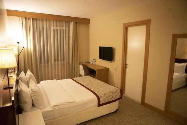 Deluxe Tek Büyük veya İki Ayrı Yataklı Oda