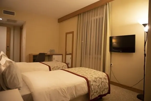 Deluxe Tek Büyük veya İki Ayrı Yataklı Oda
